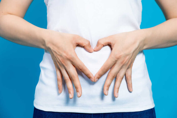 Young,Woman,Who,Makes,A,Heart,Shape,By,Hands,On