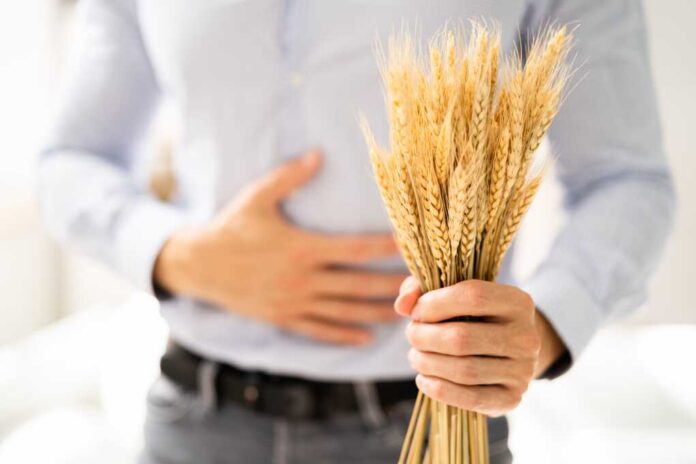Celiac,Disease,And,Gluten,Intolerance.,Women,Holding,Spikelet,Of,Wheat