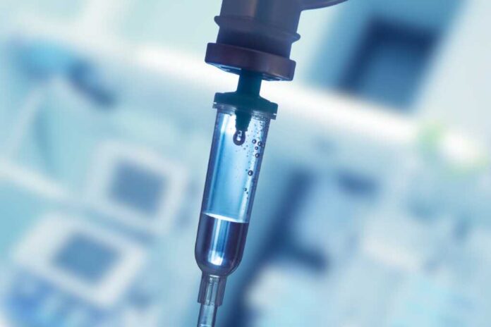 A,Close-up,Photo,Of,An,Iv,Drip,In,Progress,,With
