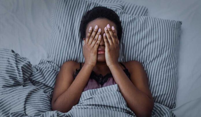 Insomnia,And,Pain.,African,American,Girl,Closed,Eyes,With,Hands