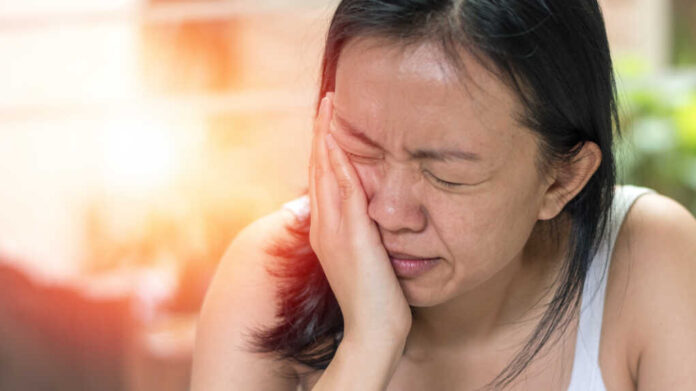 Temporomandibular,Joint,And,Muscle,Disorder:,Tmd,Concept.,Woman,Hand,On
