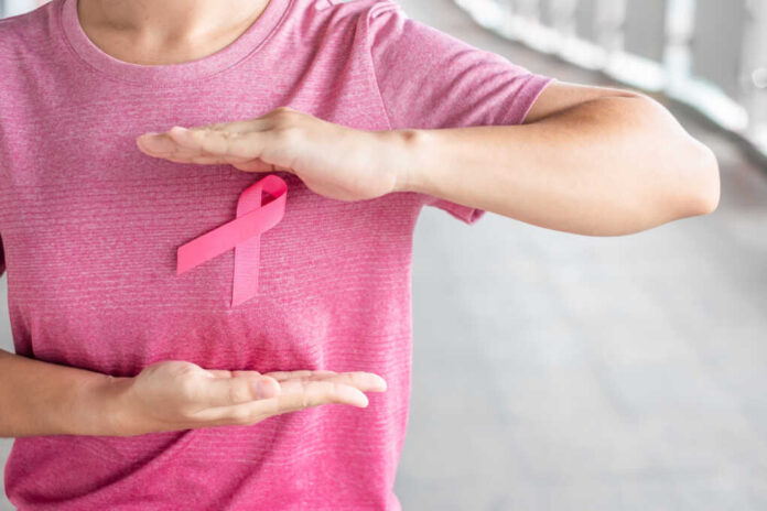 October,Breast,Cancer,Awareness,Month,,Woman,In,Pink,T-,Shirt