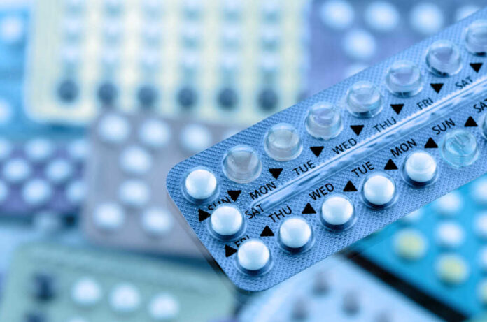 Oral,Contraceptive,Pill,On,Pharmacy,Counter,With,Colorful,Pills,Strips