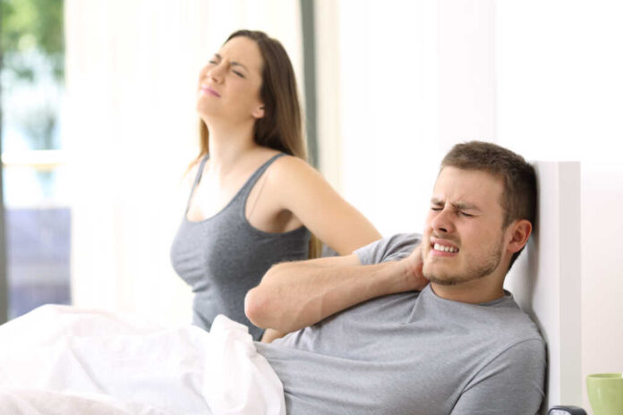Couple,Waking,Up,Suffering,Ache,After,A,Bad,Night,In