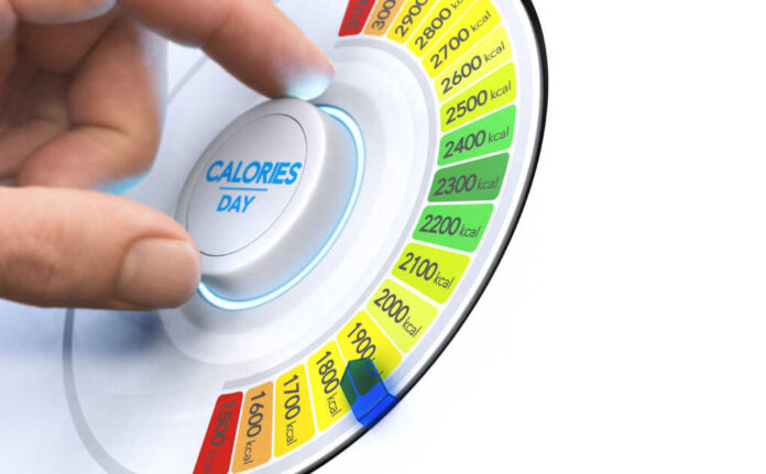 Man,Turning,A,Calorie,Knob,To,Reduce,Daily,Intake,Level.