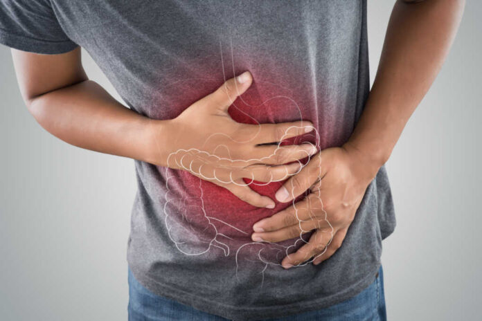 The,Photo,Of,Large,Intestine,Is,On,The,Man's,Body