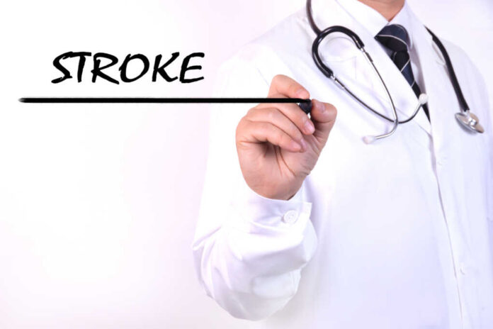 A,Doctor,In,Medical,Clothing,Writes,A,Diagnosis,,Text,Stroke