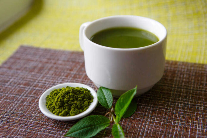 White,Cup,With,Hot,Tea,And,Dry,Powder,Of,Japanese