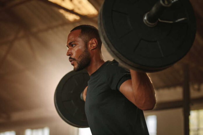 Man,Exercising,With,Barbell.,Male,Bodybuilder,Doing,Weight,Lifting,Workout