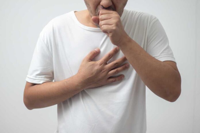 Man,Wearing,White,Shirt,Coughing,On,White,Background