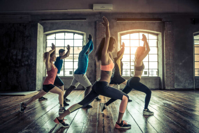 Group,Of,Sportive,People,In,A,Gym,Training,-,Multiracial